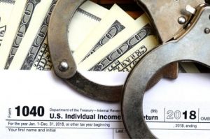 Iowa Tax Fraud Defense criminal tax segment block 300x199 1